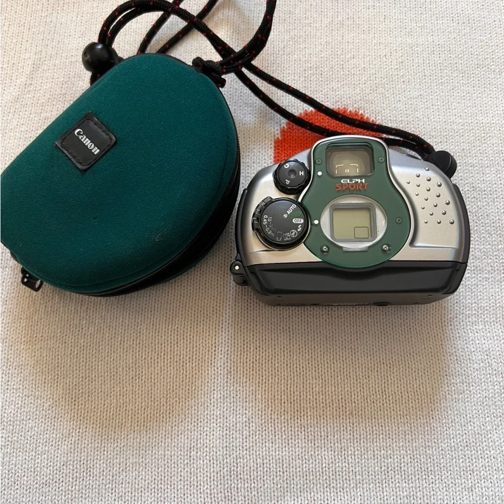 Canon Silver and Green Digital Camera(does not come with battery)